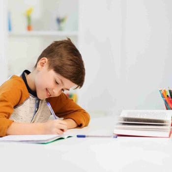 happy kid doing psychoeducational testing